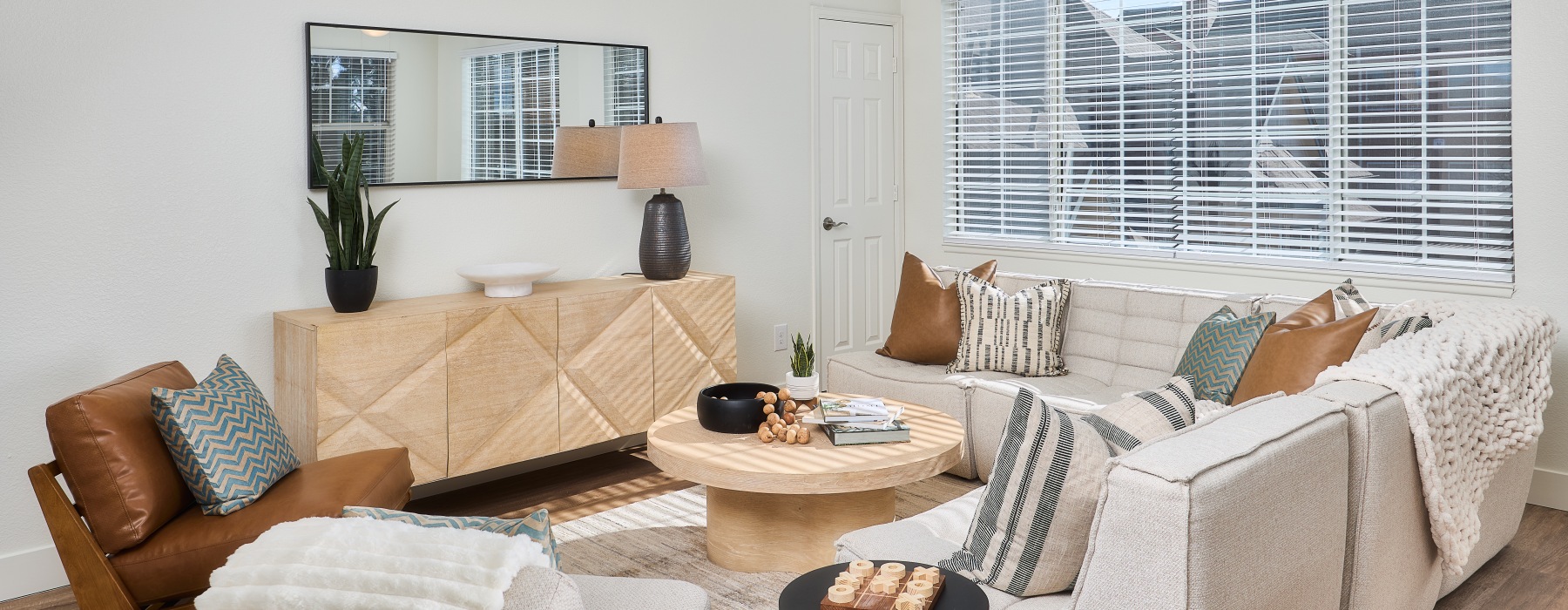 a living room with a couch and a table
