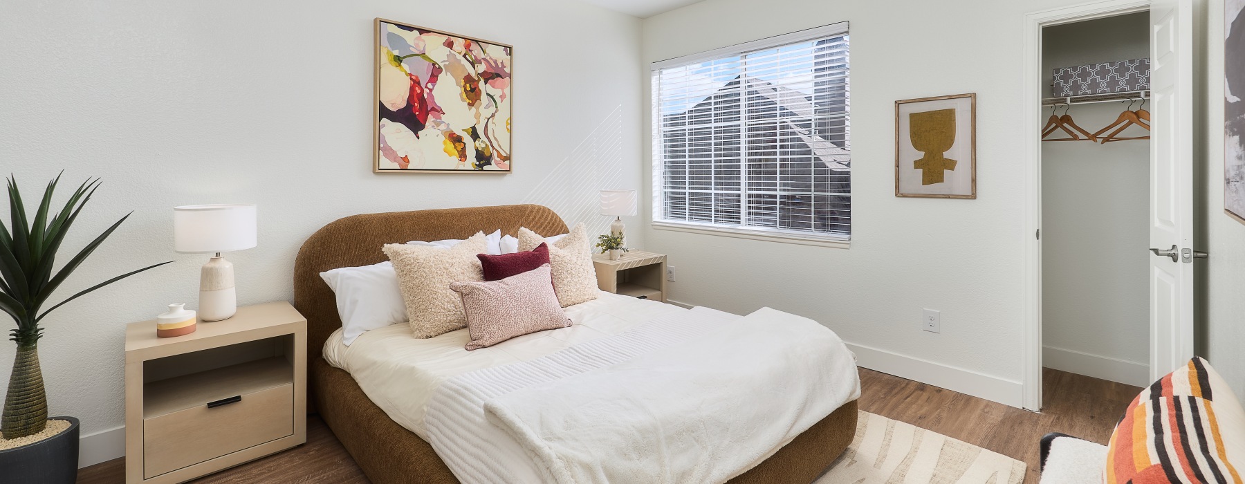 a living room with a couch and chairs