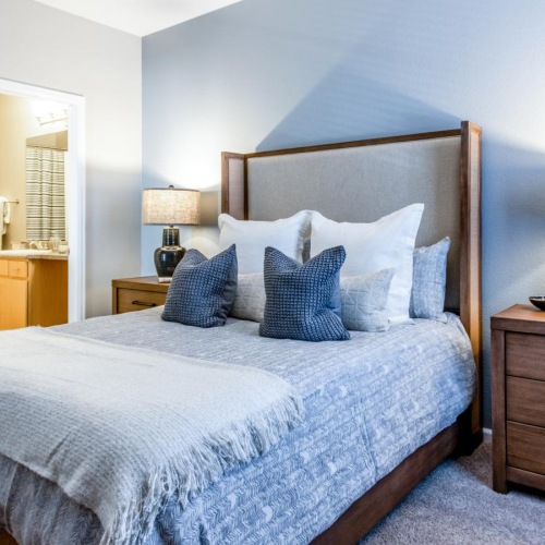 Bedroom options to fit every lifestyle a bed with blue pillows