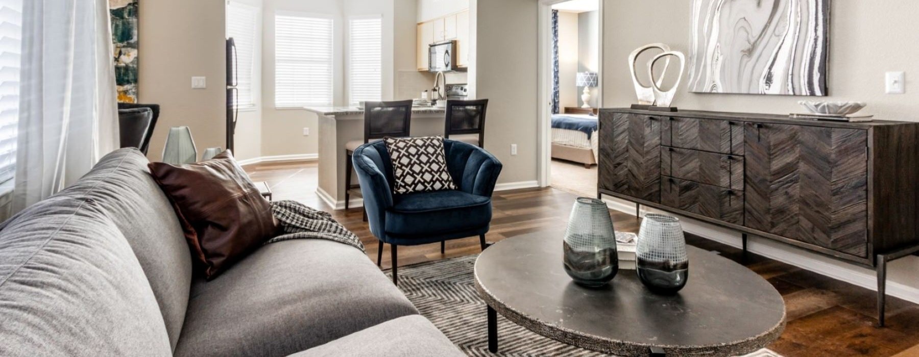 a living room with a couch and a table