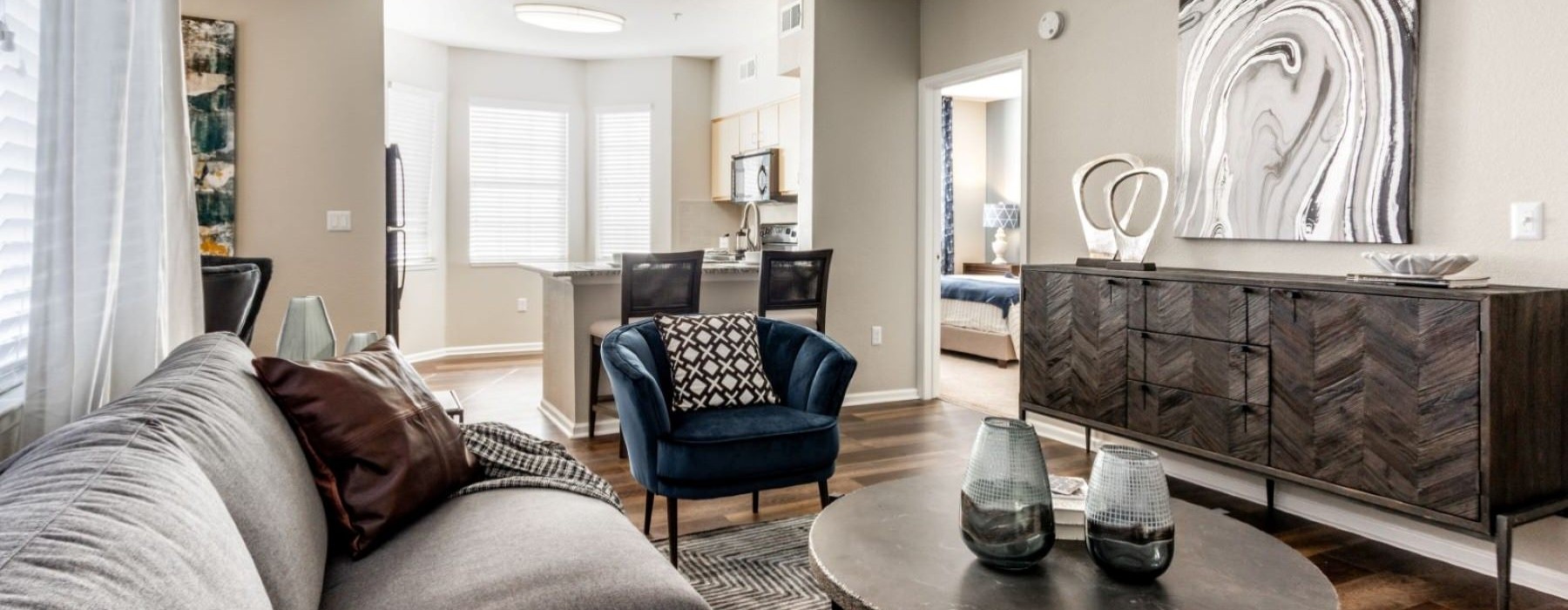 a living room with a couch and a table