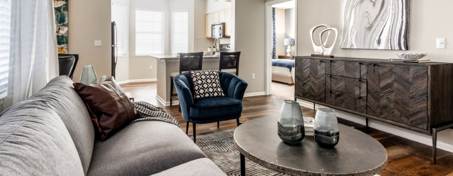 a living room with a couch and a table