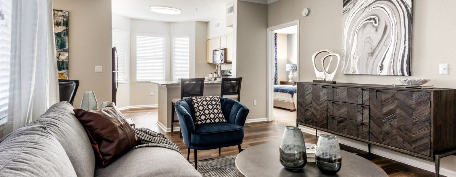 a living room with a couch and a table