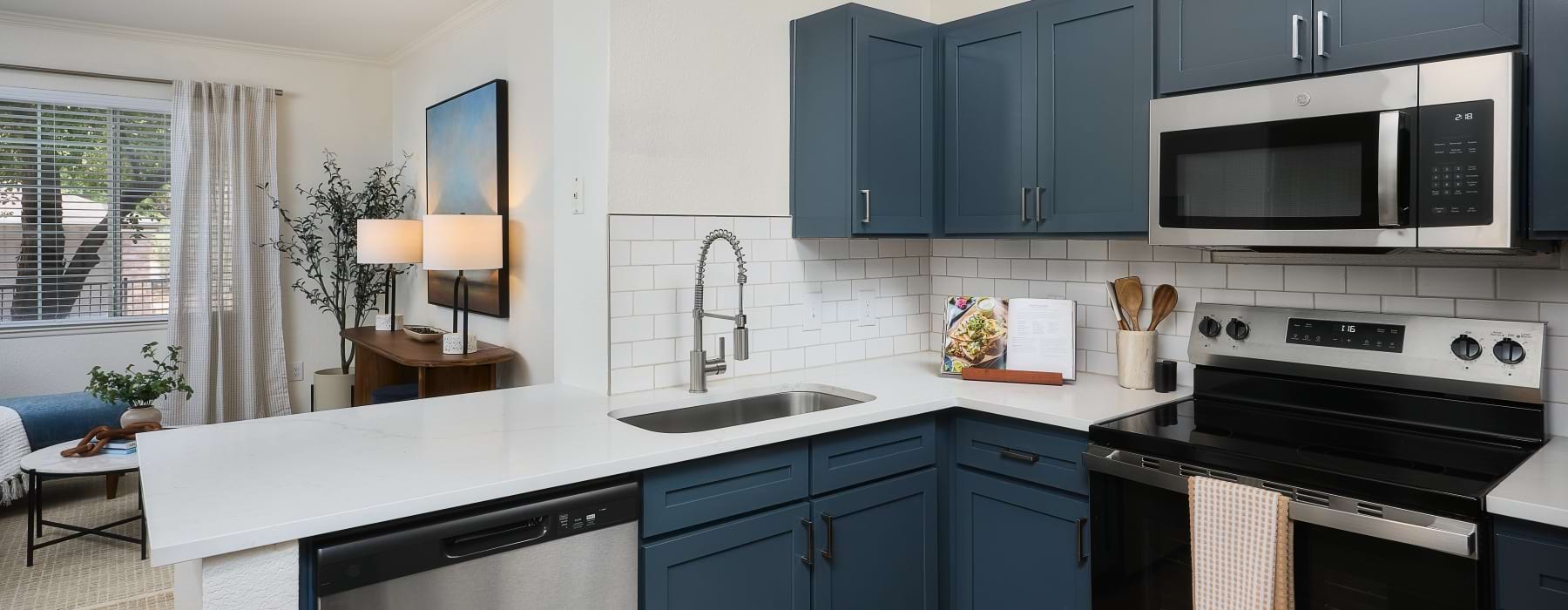 kitchen with bright lighting and ample counter space