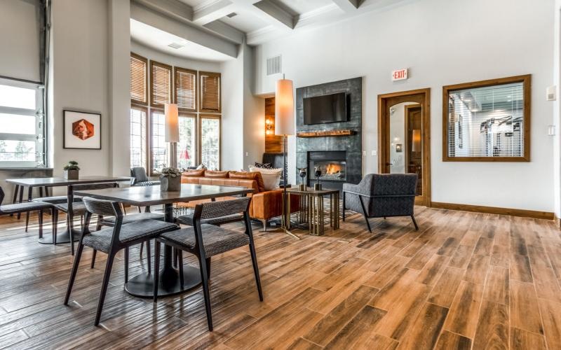 Everything within reach a clubroom with a table and chairs